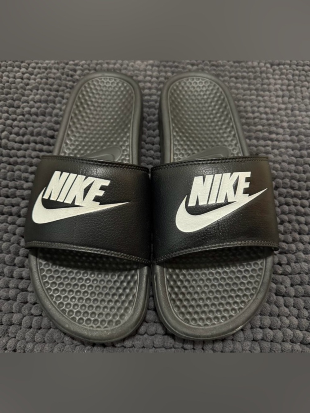 Nike Black Slides with White Swoosh Logo